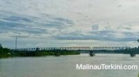 Kemegahan Jembatan Rangka Baja Sungai Sesayap Malinau yang membentang sepanjang 375 meter di atas Sungai Sesayap, menjadi ikon konektivitas di Kalimantan Utara.